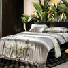 Four-piece digital printed cotton bedding set with abstract patterns, ideal for stylish bedrooms