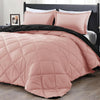 Soft twin comforter set in pink and black with pillow sham, suitable for cozy year-round sleeping